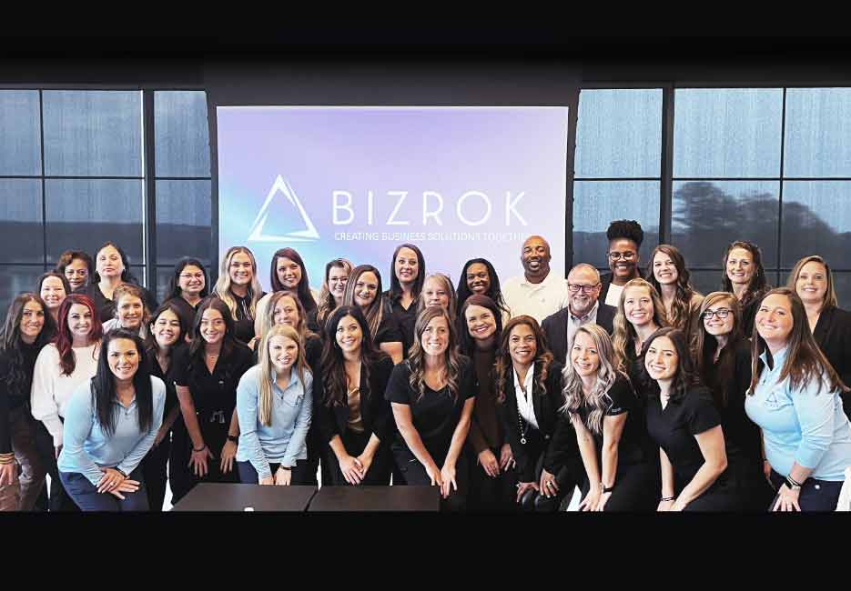 Bizrok-team-members-posing-with-clients-FULL-SIZE