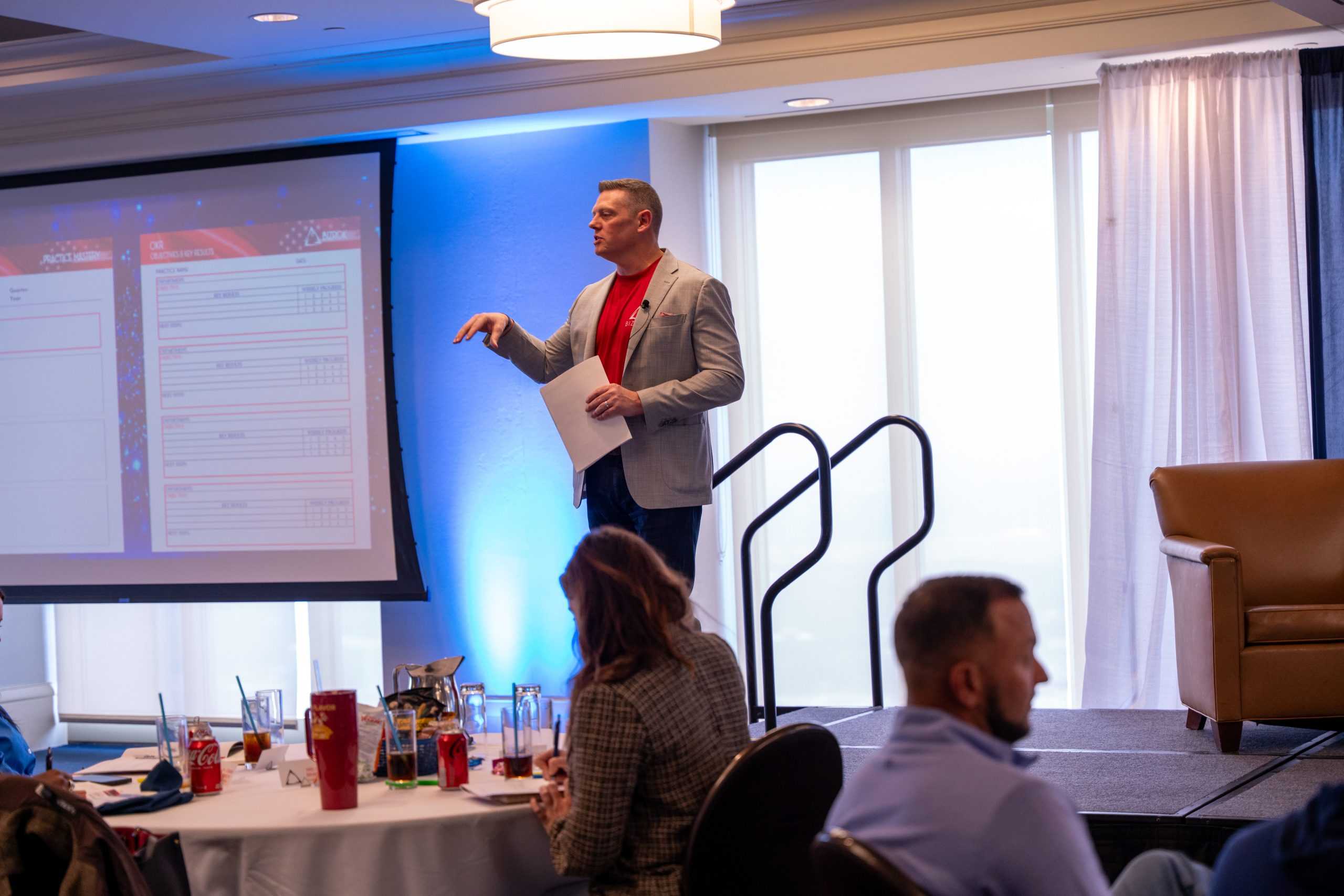 Business coach leading a strategy session in a conference room